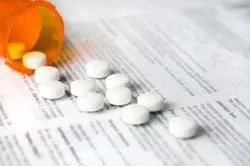 medication bottle with pills