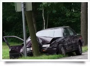 car crashed into a tree